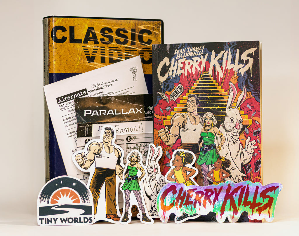 Collection of 'Cherry Kills' merchandise including a book, stickers, and a poster on a light background.