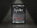 E-reader displaying the book cover of 'The Spider' by Hanna Delany on a dark background.