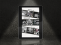 Digital tablet displaying an ebook cover for "Produce, Me?" by J. Curtis, black and white collage of images on a dark textured background